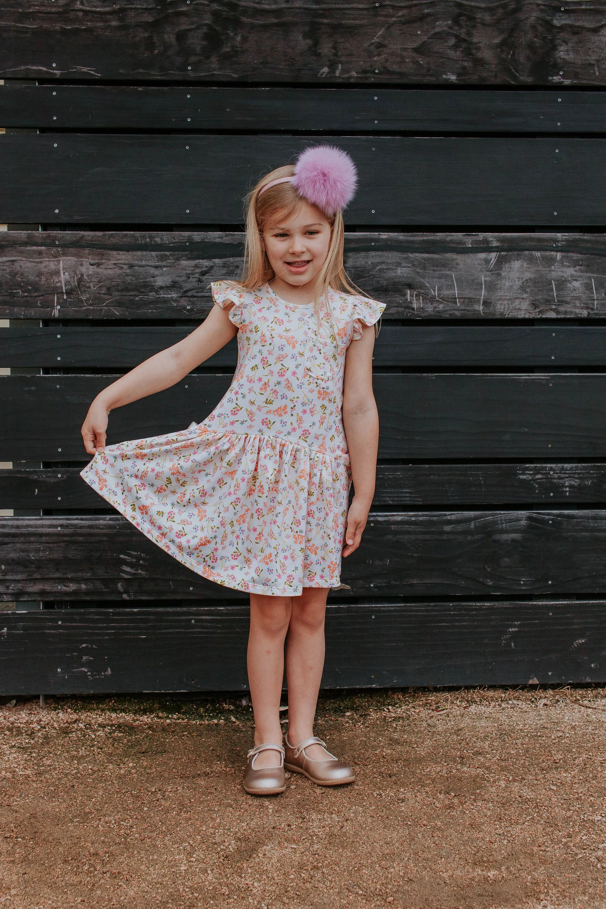 Little Girl's Ivory Floral Jersey Three Pocket Dress