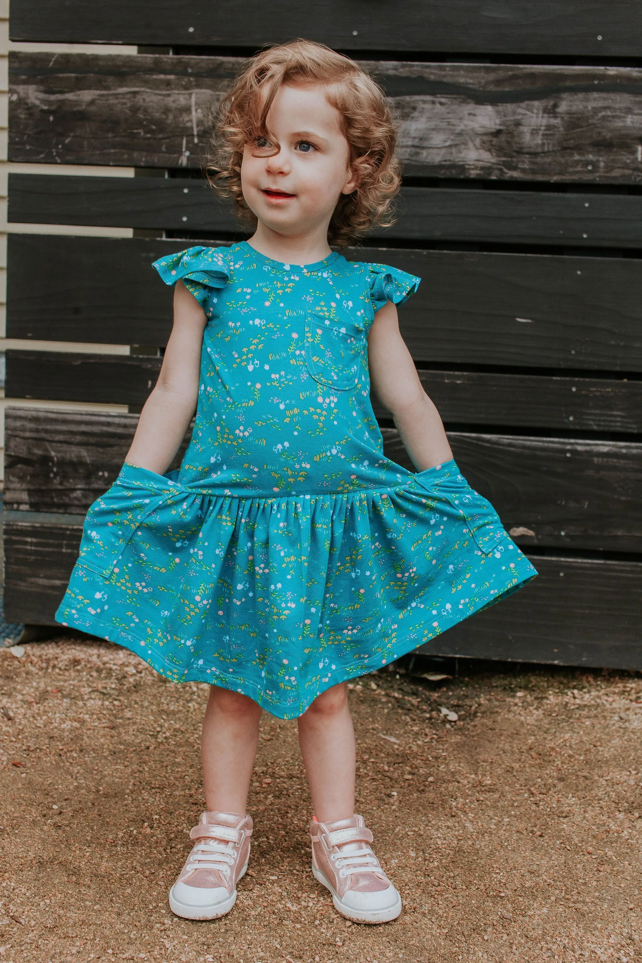 Little Girl's Turquoise Floral Jersey Three Pocket Dress