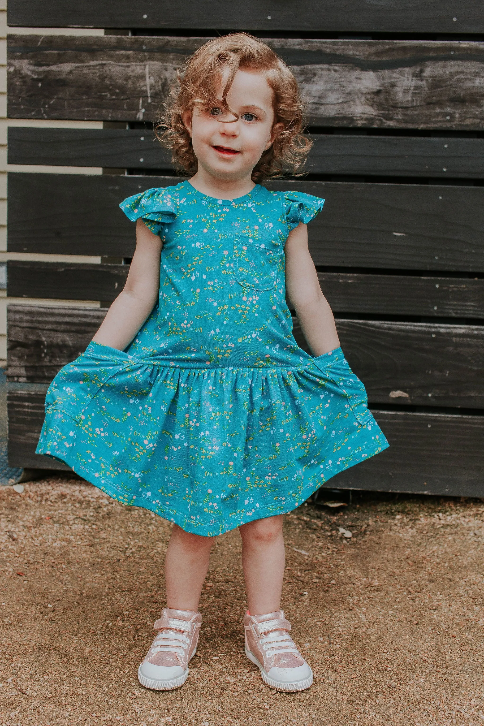 Little Girl's Turquoise Floral Jersey Three Pocket Dress