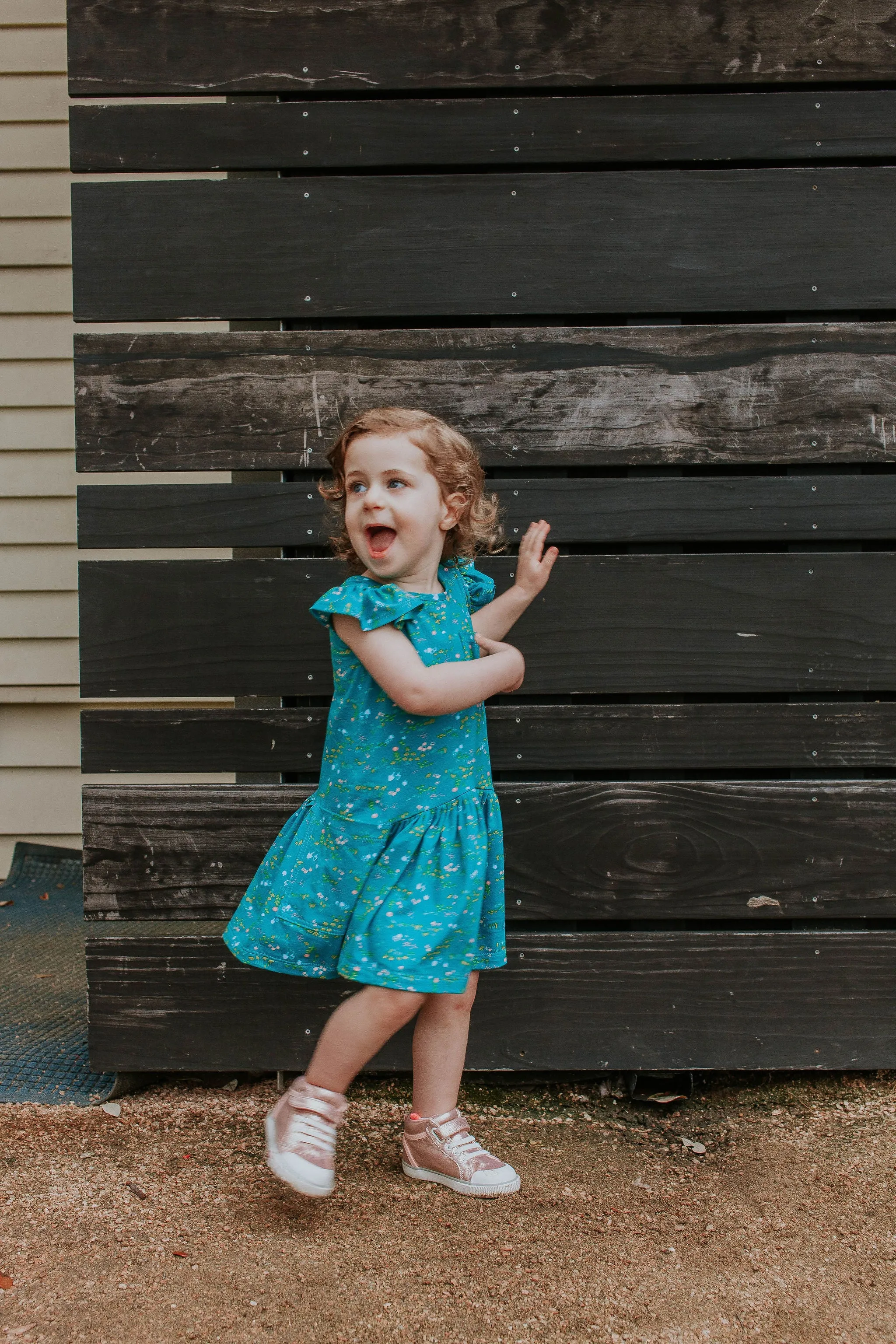 Little Girl's Turquoise Floral Jersey Three Pocket Dress