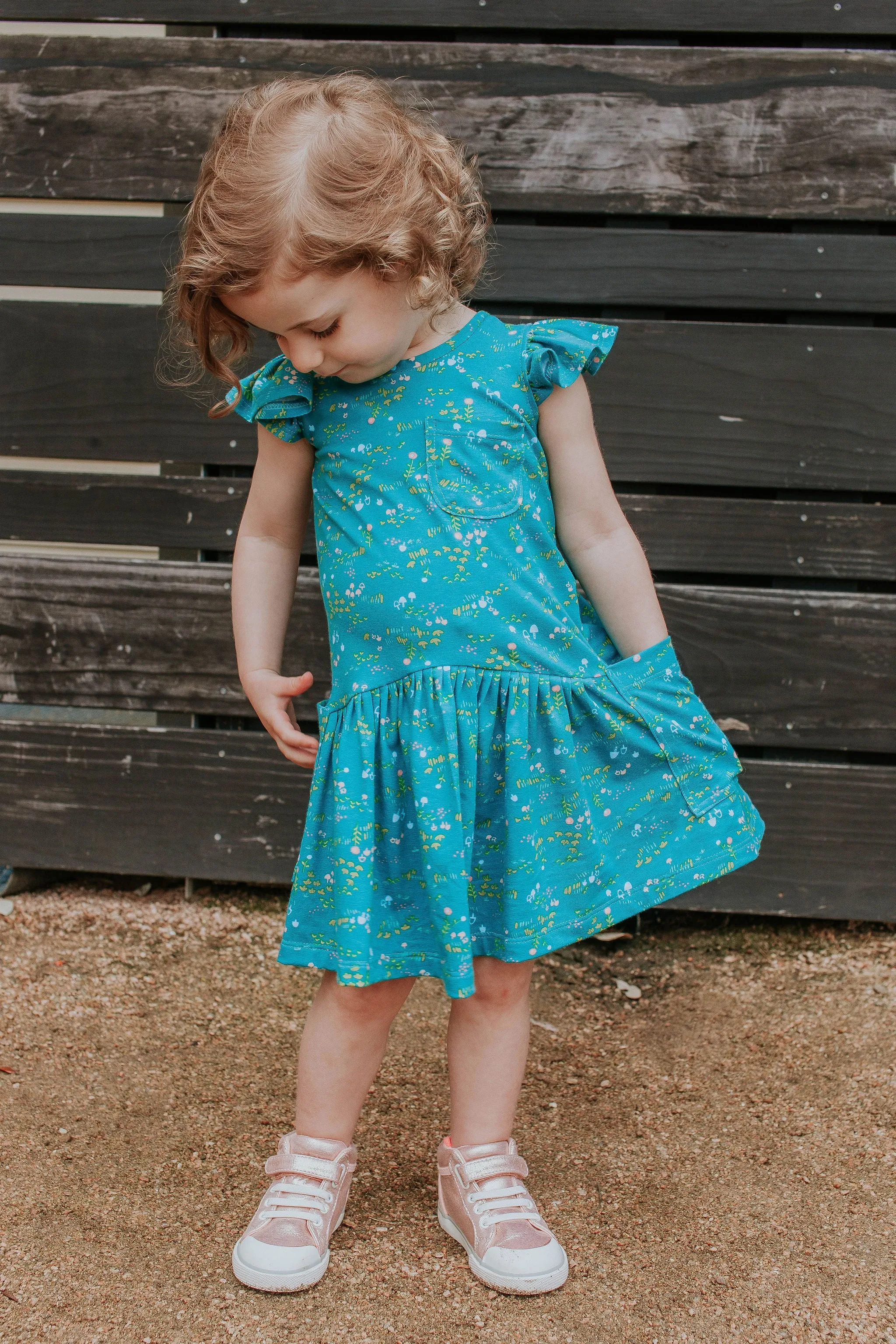 Little Girl's Turquoise Floral Jersey Three Pocket Dress