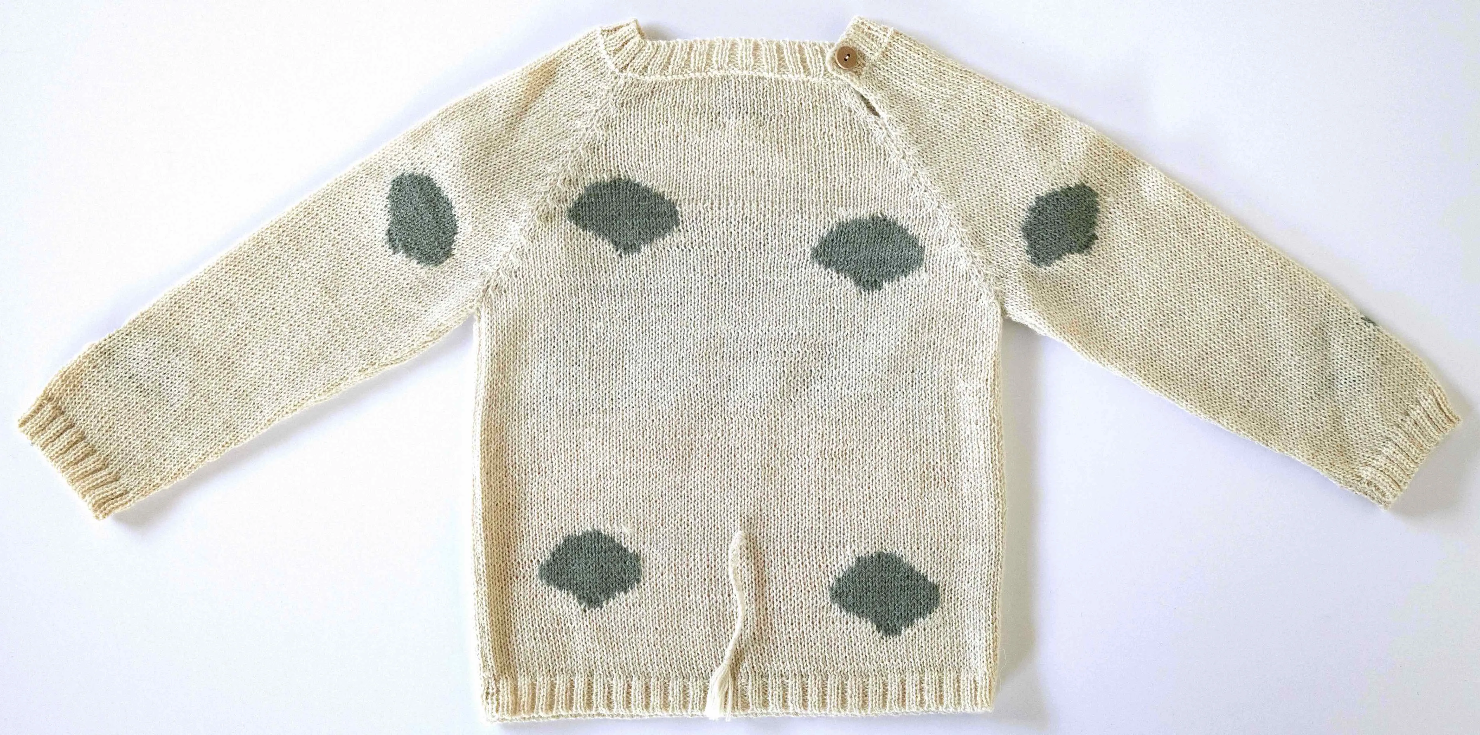 NW516 GREEN CO ON CREAM SWEATER